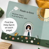 Children's book featuring Mother Mary praying, find the Holy Spirit.