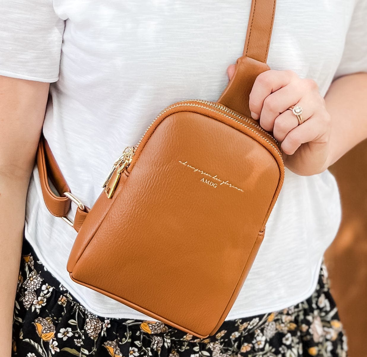 AMDG brown leather bag close up lifestyle