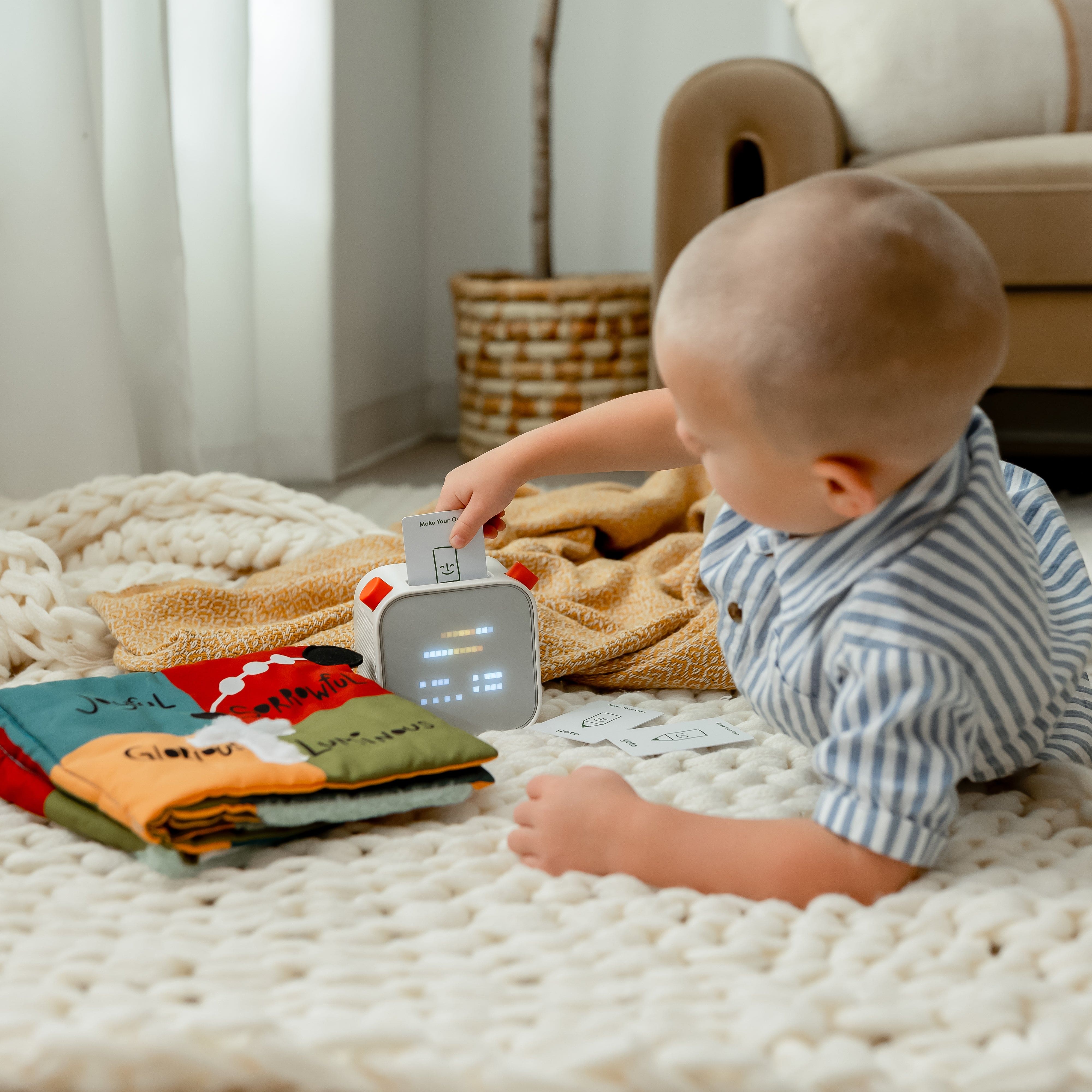 Baby interacting with MP3yoto lifestyle device