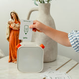 Child holding Make Your Own card