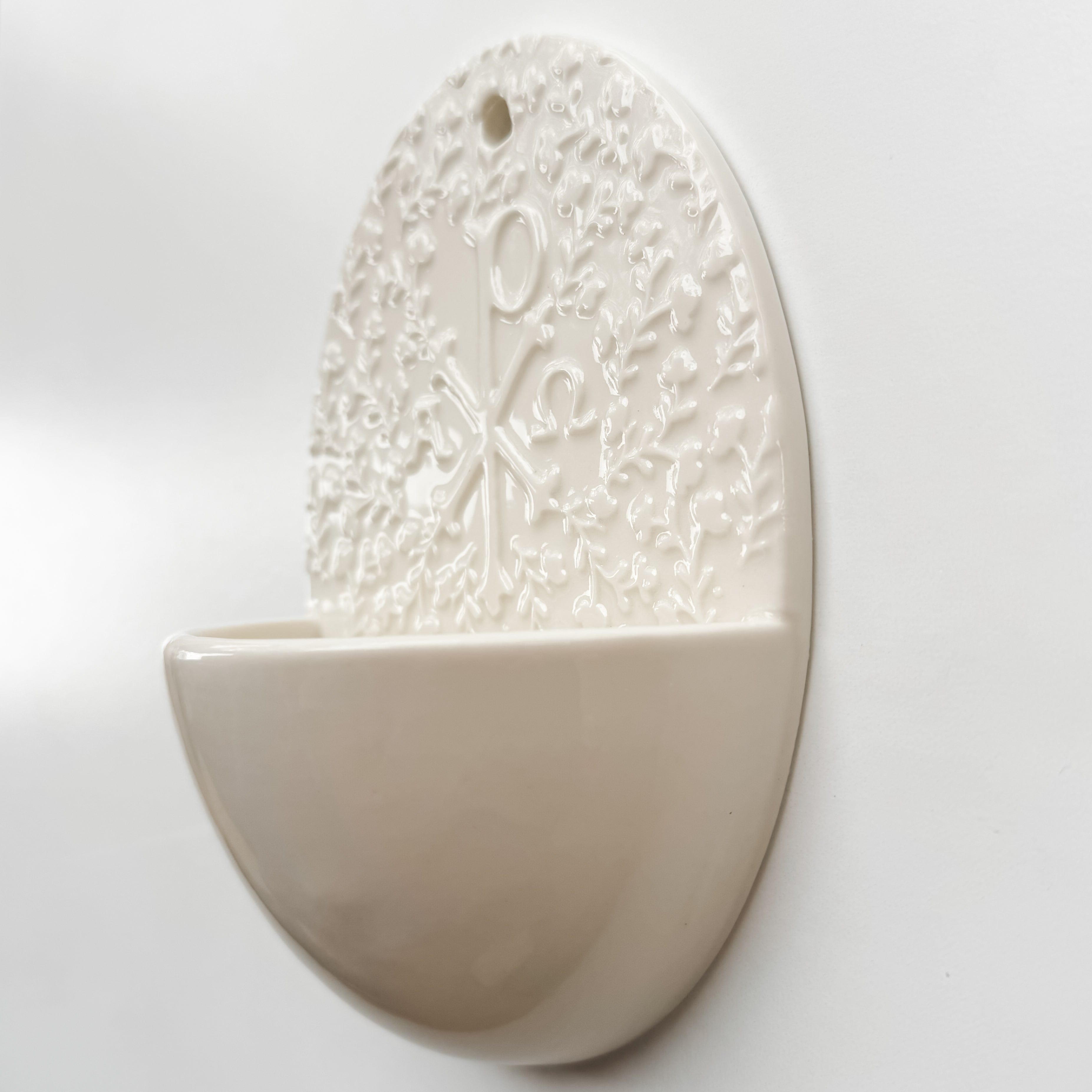 Holy Water Font with Chi Rho symbol