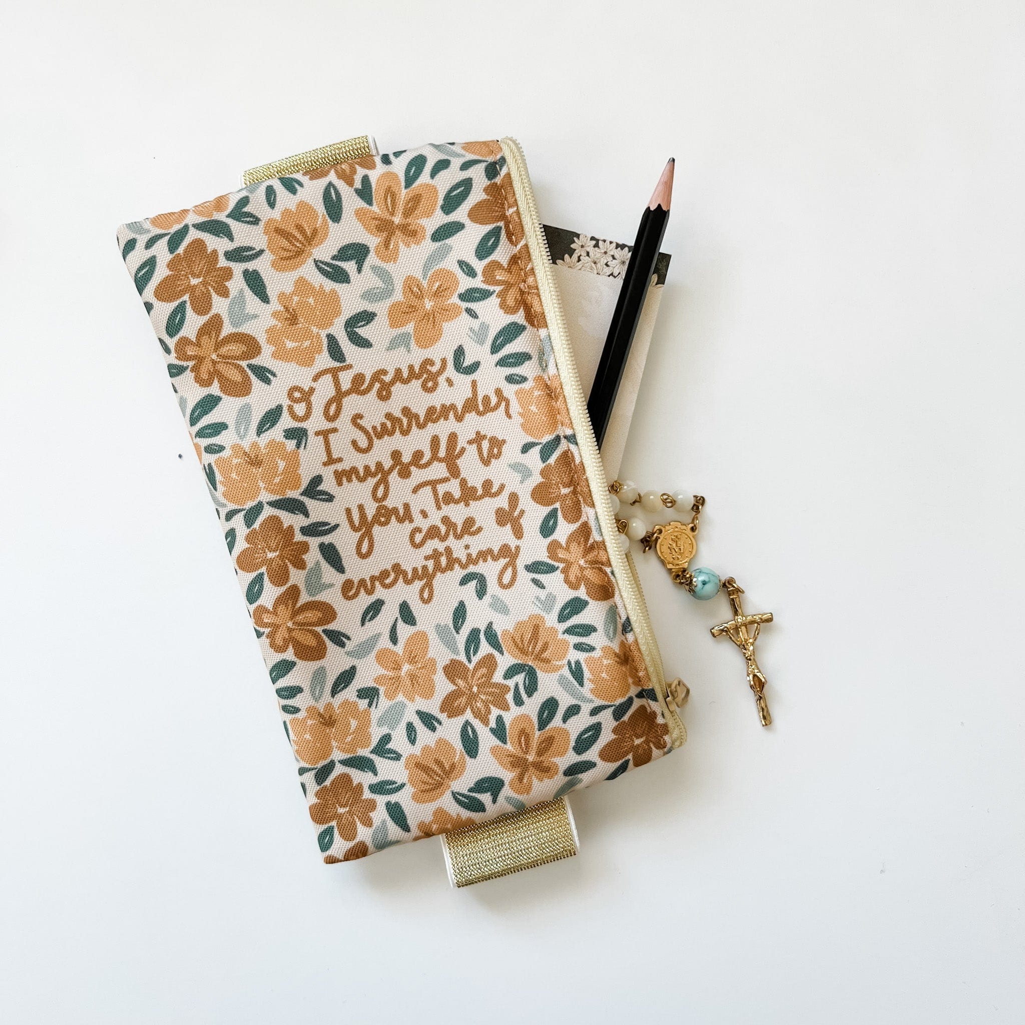 Floral prayer journal with pencil and rosary
