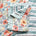 Folded floral quilt with text.