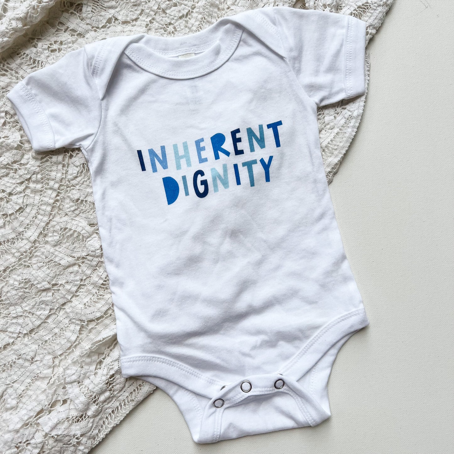 Inherent Dignity Baby Onesie