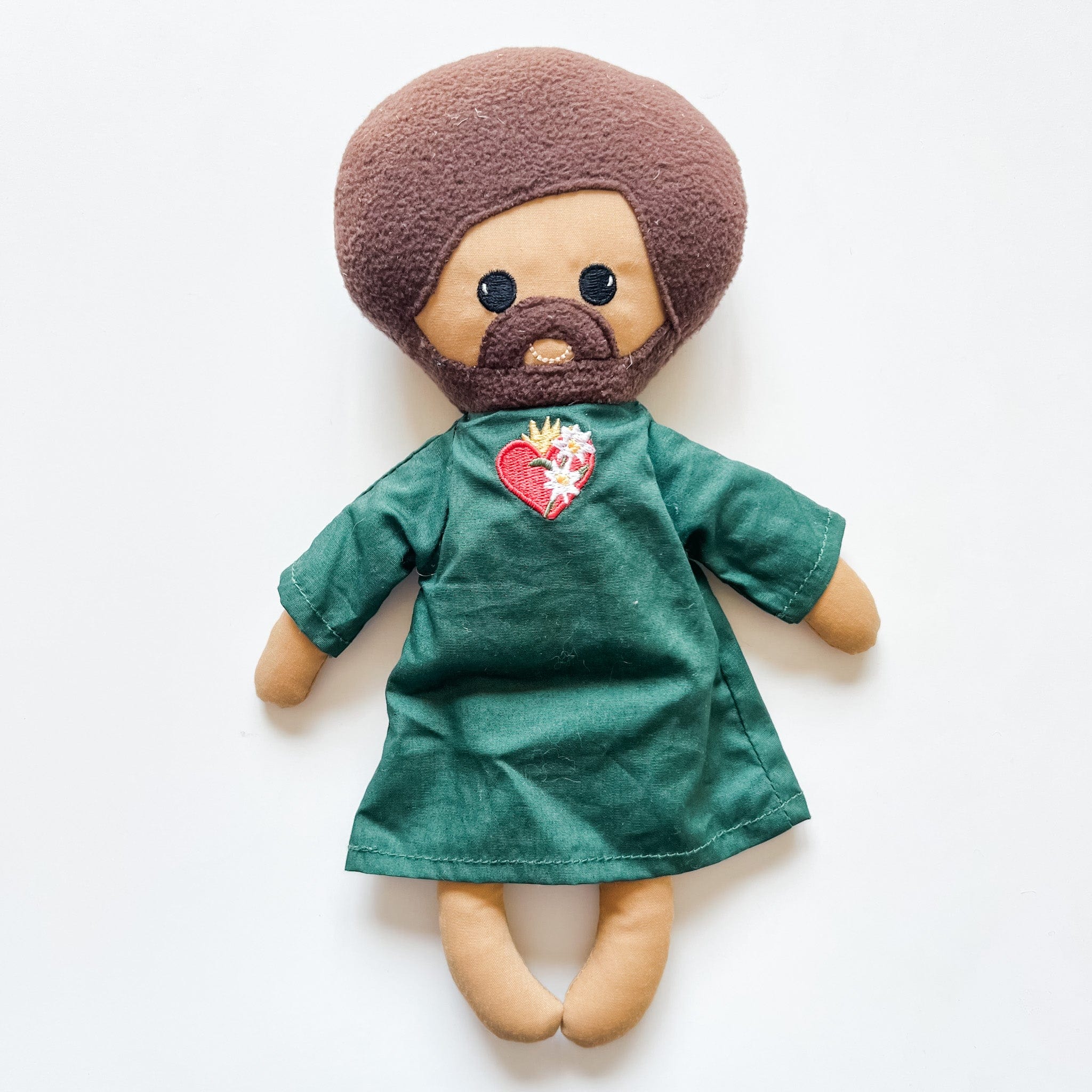 Handmade doll with brown afro and green robe