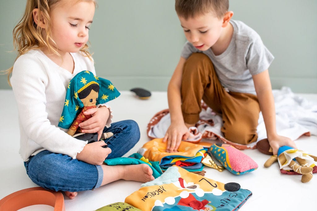 Two children playing with toys.