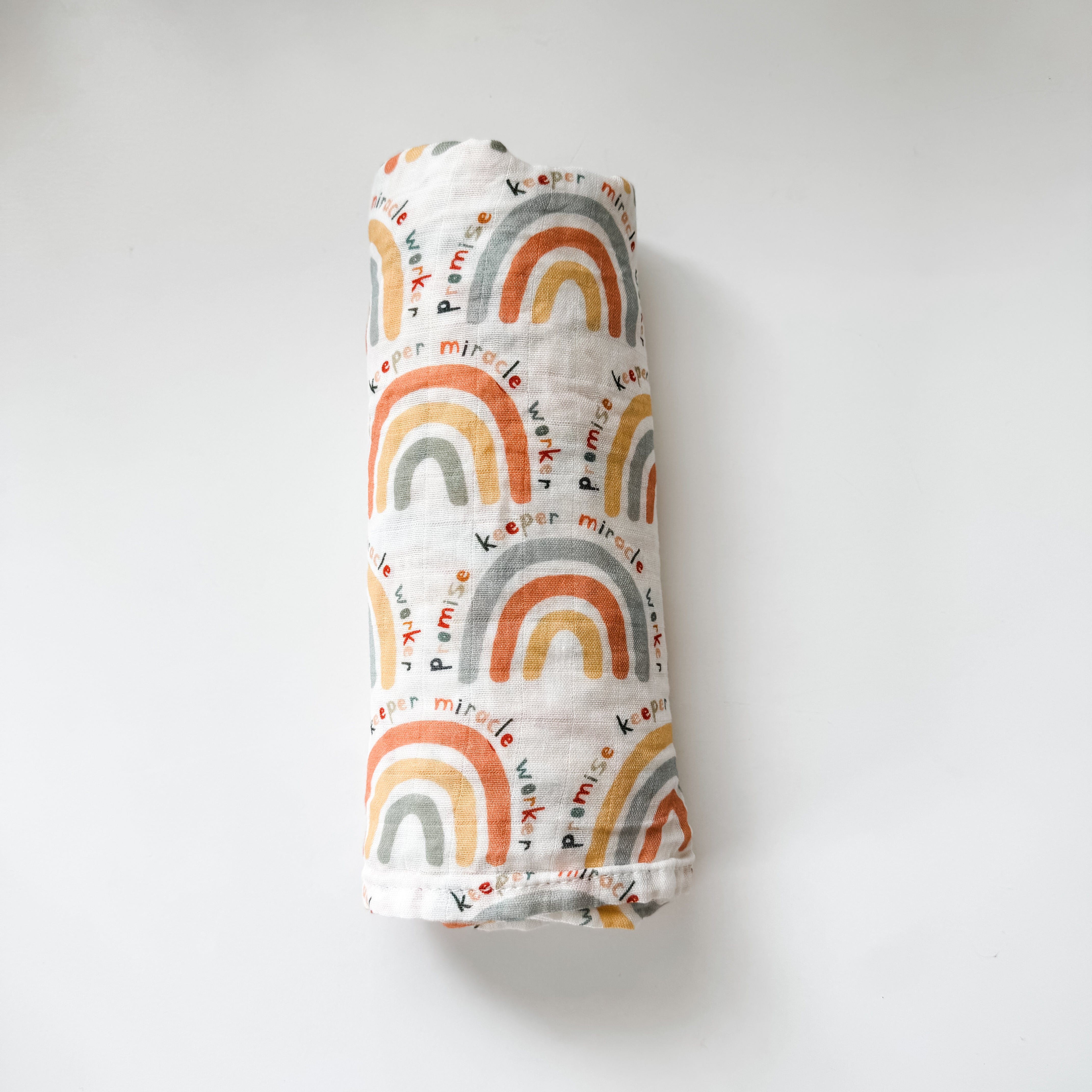 Rainbow swaddle blanket with promise keeper design
