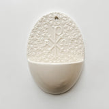 Holy water font with Chi Rho symbol
