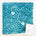 Teal blanket with white wave and star pattern.