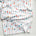White fabric with colorful dots and crosses.