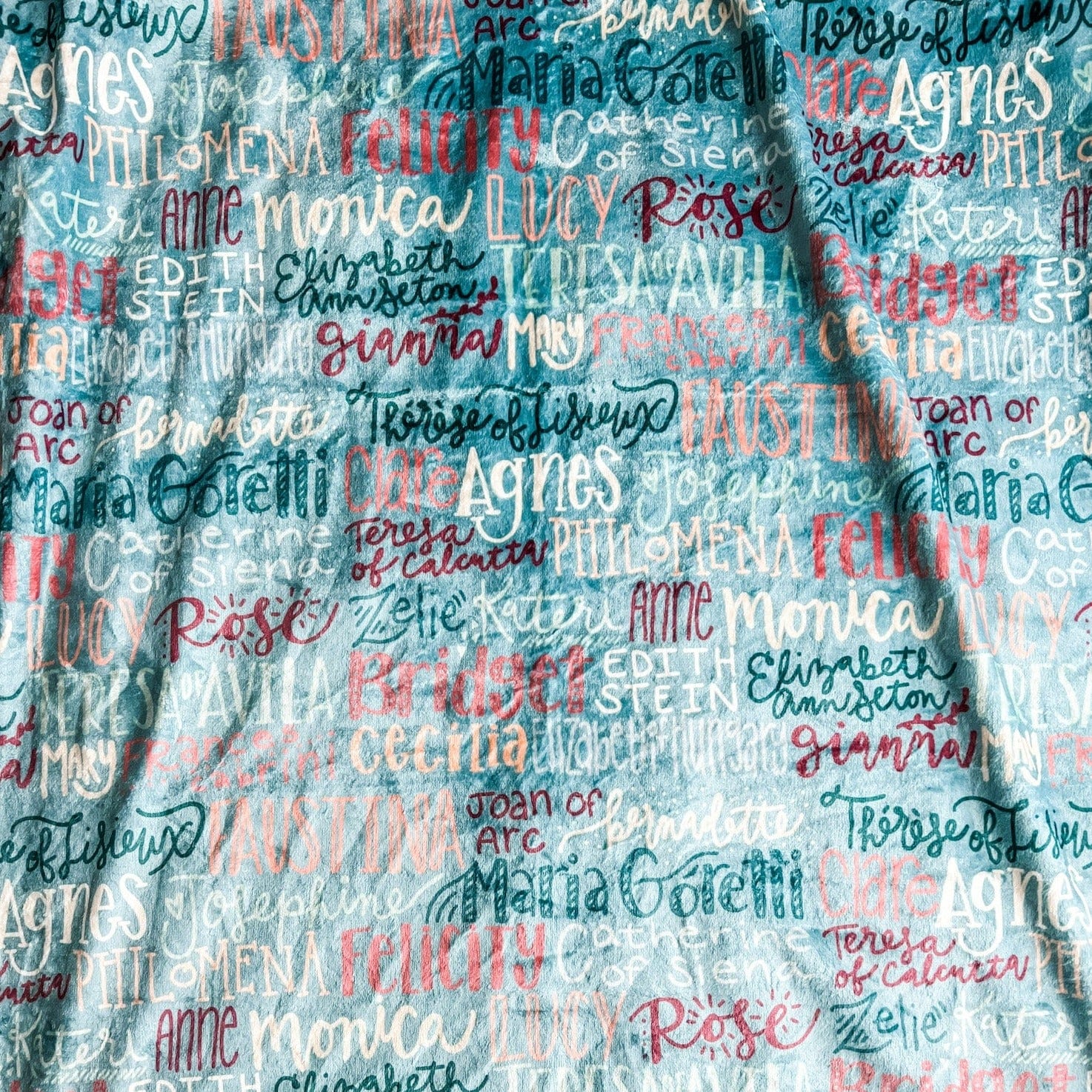Fabric with names in various colors.