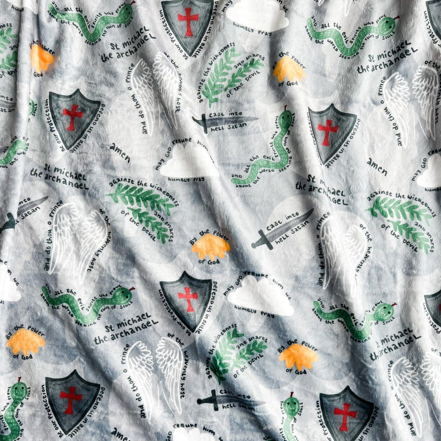 Patterned fabric with religious symbols.
