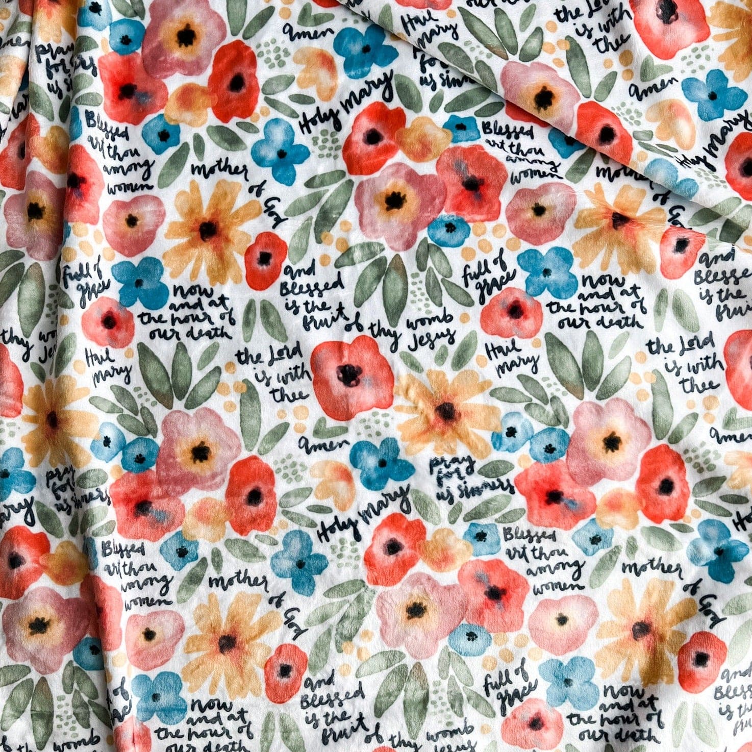 Floral fabric with text.