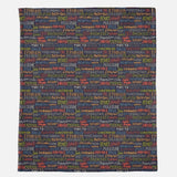 Blanket with names of saints in various colors