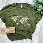 Olive green Solovedtheworld shirt with floral world map.