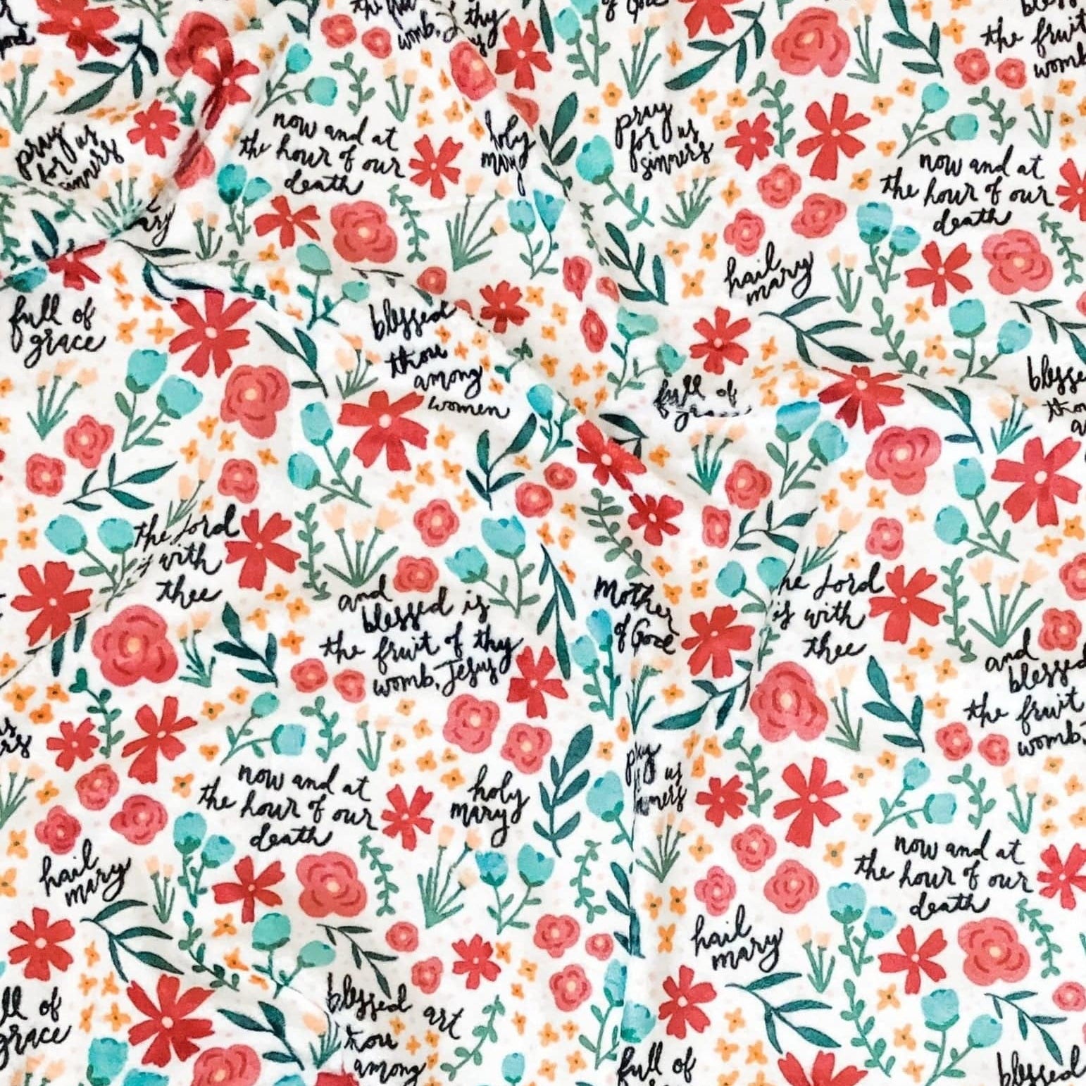 Floral fabric with religious text