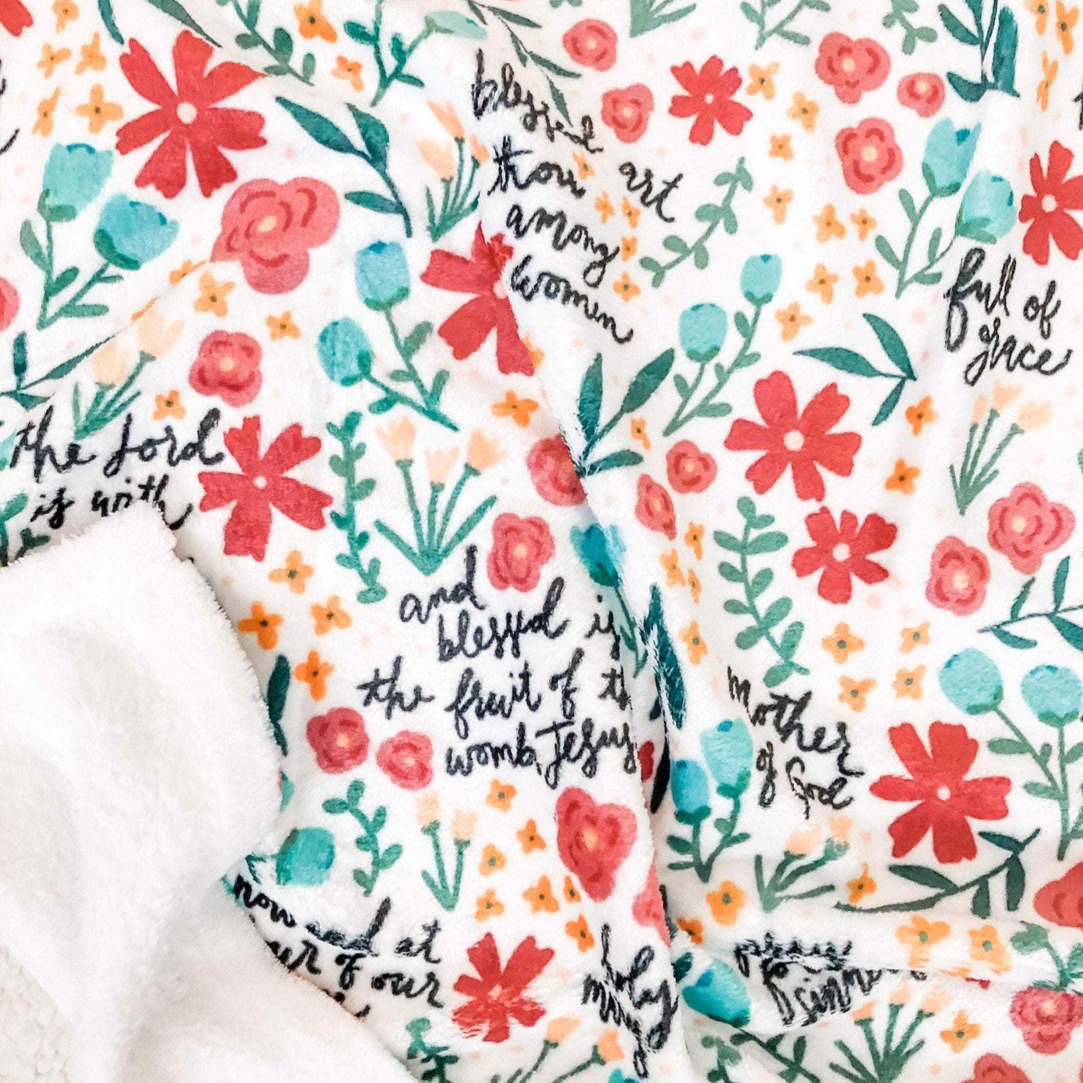 Floral blanket with Bible verse