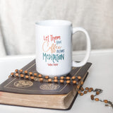 Coffee mug with Let Them Have Coffee Before Meditation quote.