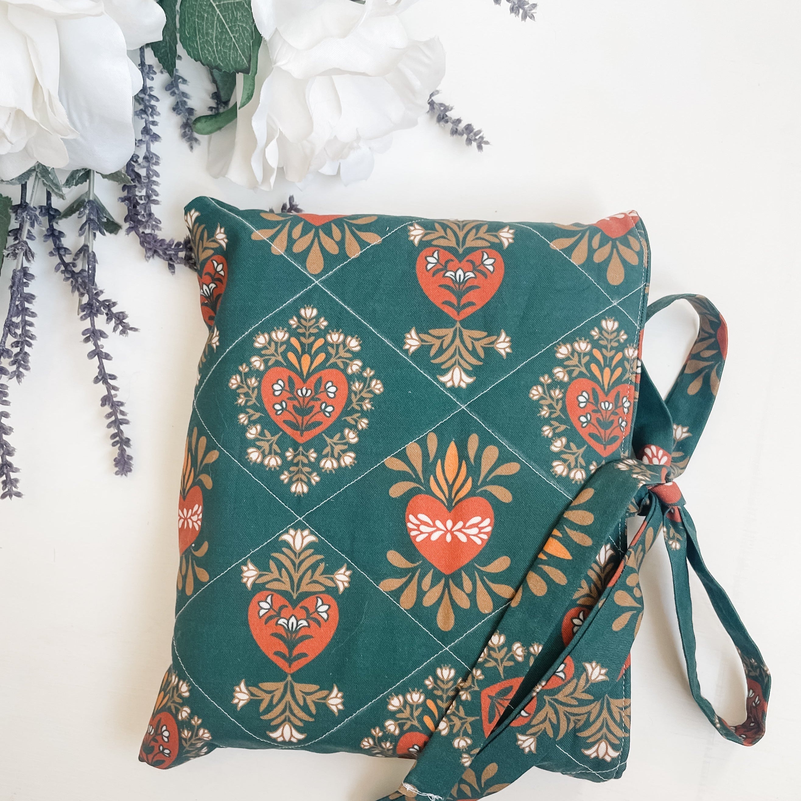 Handmade quilted Bible cover in Holy Family fabric used for daily Scripture reading