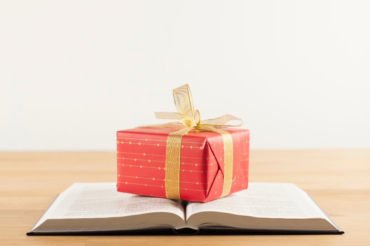 Inexpensive Christian gifts with Bible and wrapped present