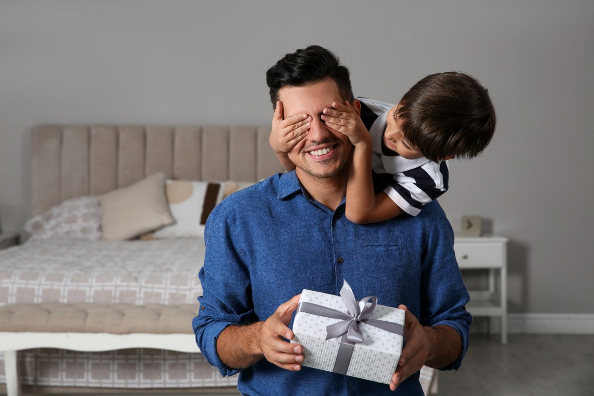 Son gifting father Christian gift ideas for him.