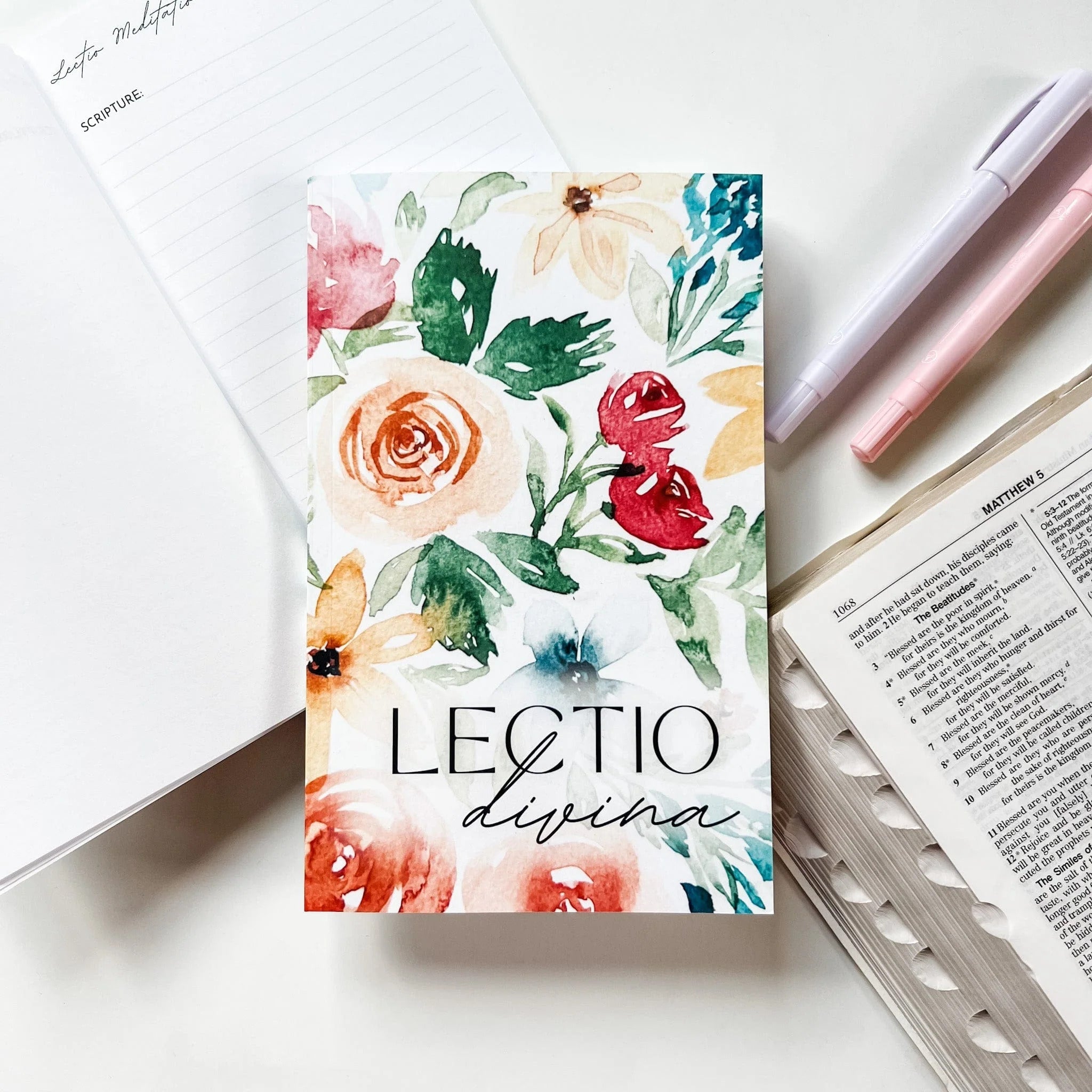 lovely option for the best prayer journal for women on a table alongside a Bible