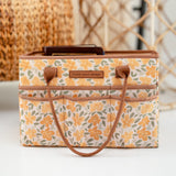 Floral-patterned prayer caddy holding bible