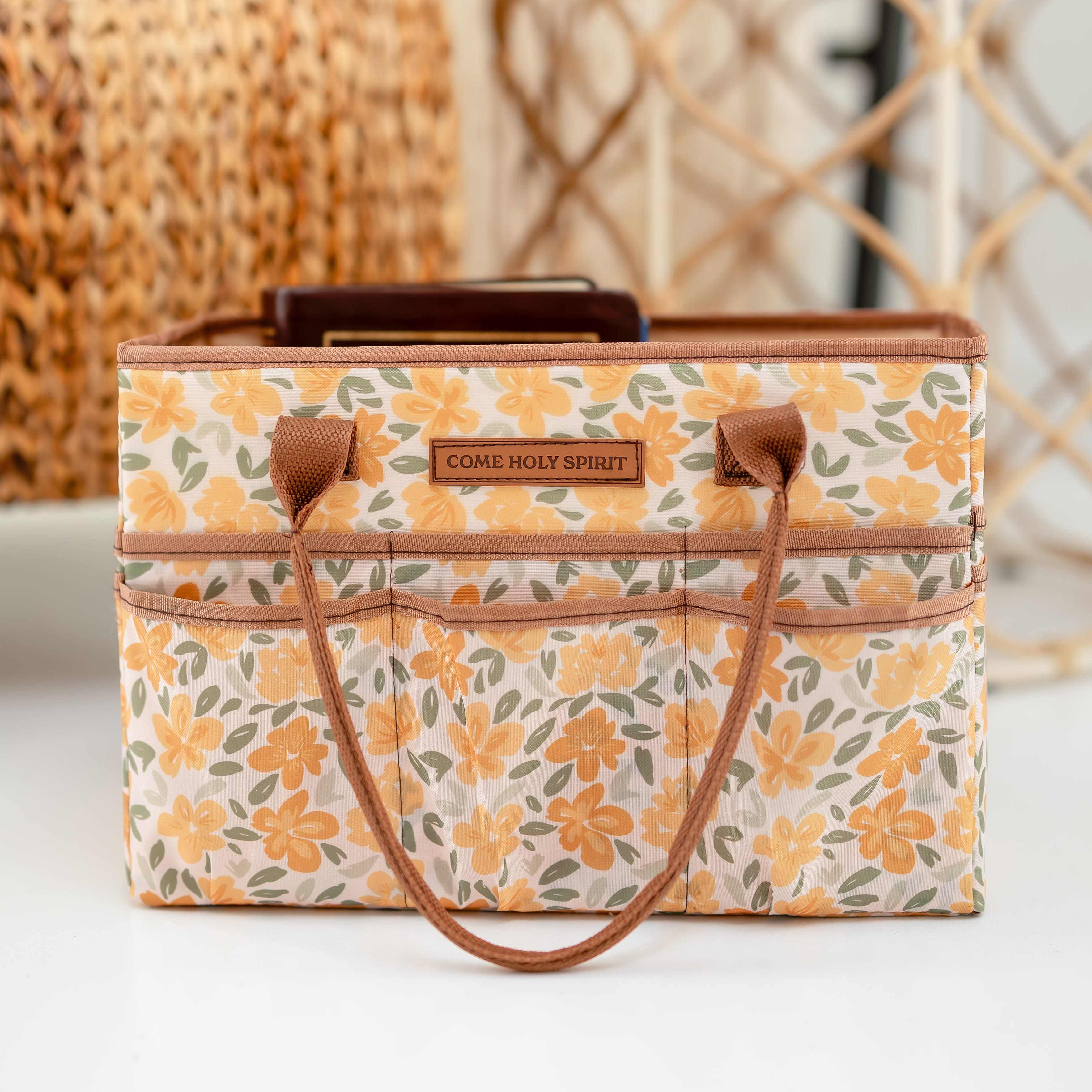 Floral-patterned prayer caddy holding bible