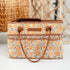 Floral-patterned prayer caddy holding bible