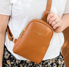 AMDG brown leather bag close up lifestyle