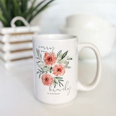 White mug with floral design.