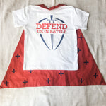 White shirt and red cape with cross symbols.
