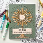 Coloring book with religious image and crayons.