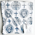 White cloth with blue religious symbols.
