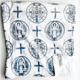 White cloth with blue religious symbols.