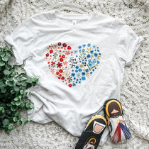 White t-shirt with floral heart design.