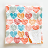 Valentine's Day heart blanket with inspirational words.