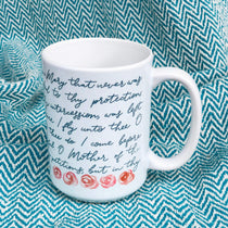Coffee mug with prayer text on blue background