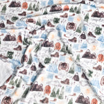 Adventure-themed fabric with mountains, backpacks, trees, & more.